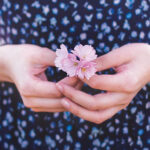 a girl with a flower