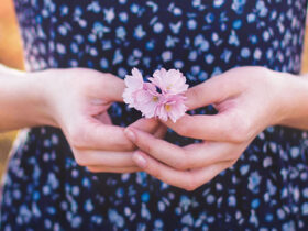 a girl with a flower