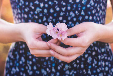 a girl with a flower
