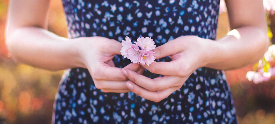 a girl with a flower