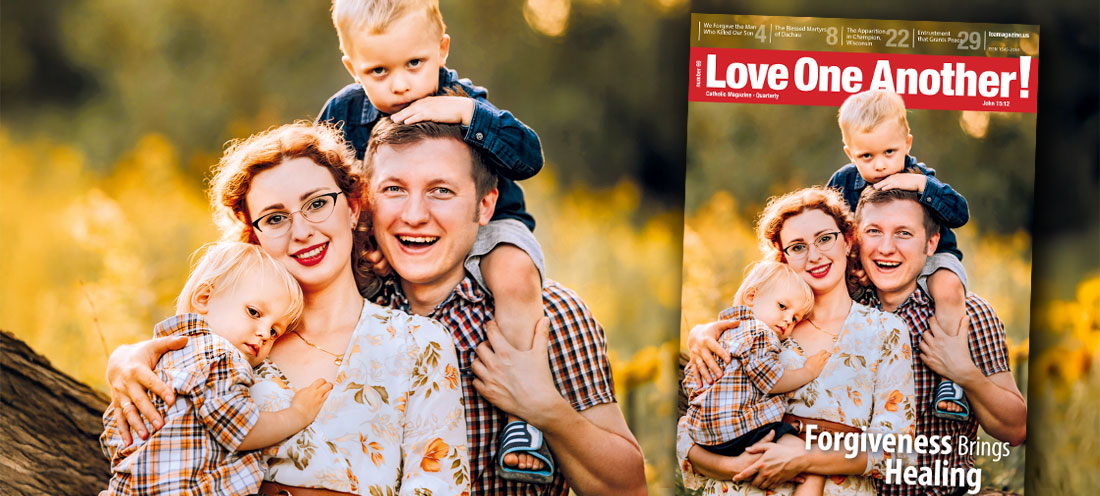 A happy family against the backdrop of a meadow. Love One Another 3-2026
