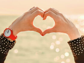 a heart shape made with fingers